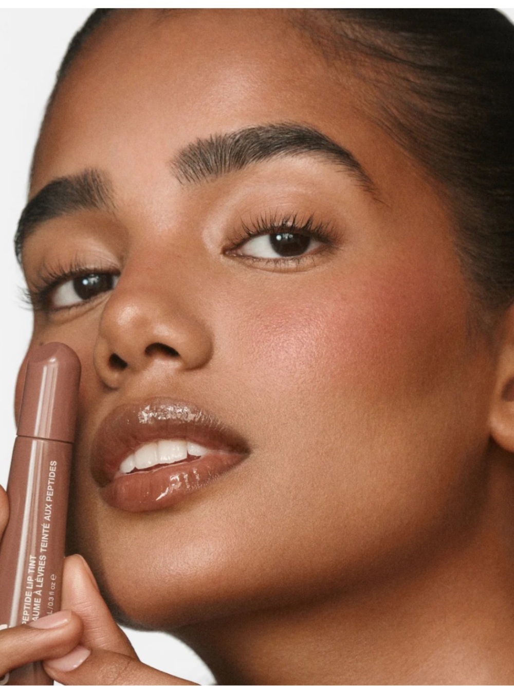 Rhode Limited edition peptide lip tint in Macadamia Butter— Sold out online